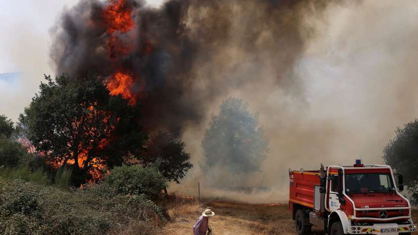 FILE PHOTO: Wildfire rages in Galicia