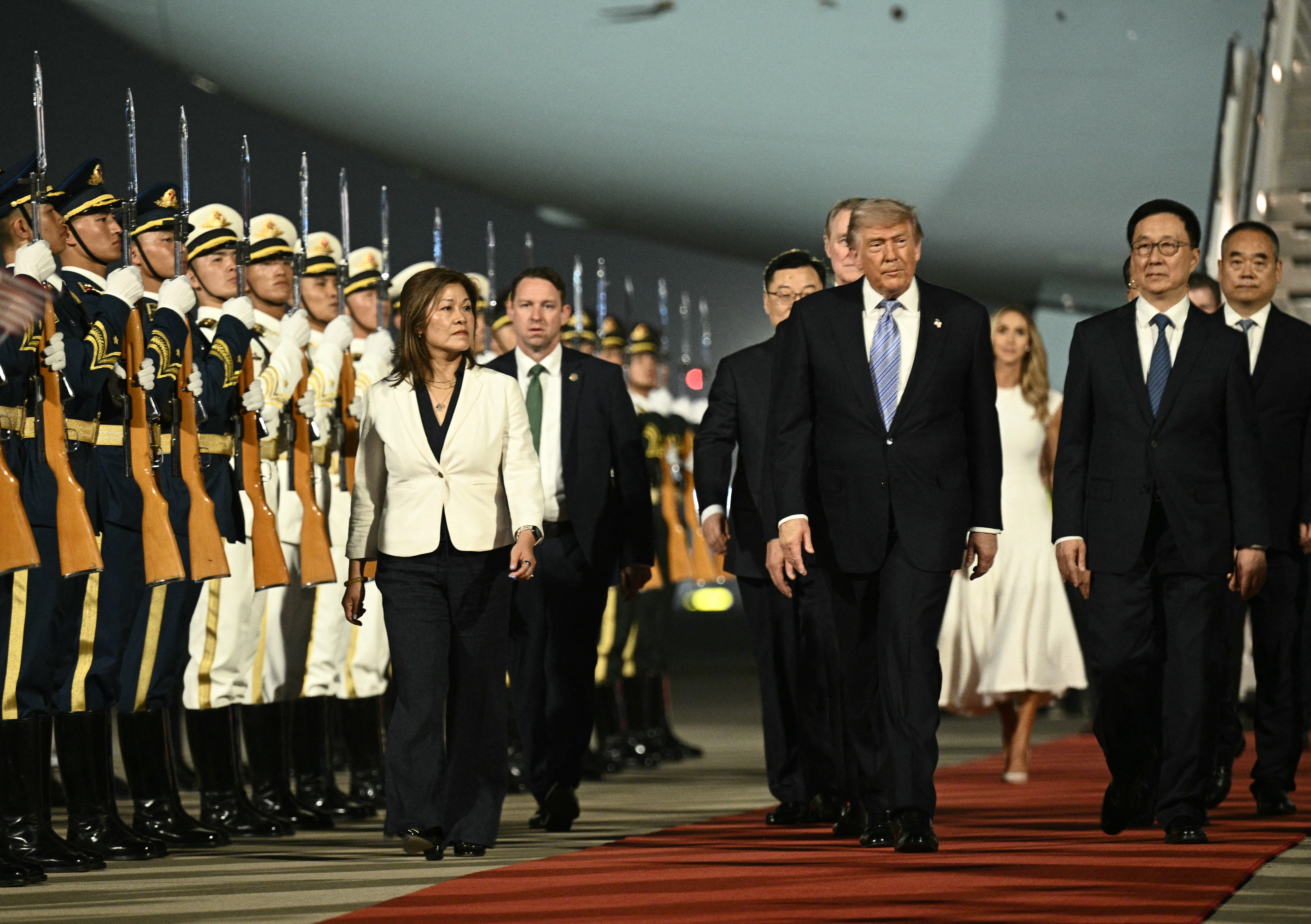 Trump lands in Beijing