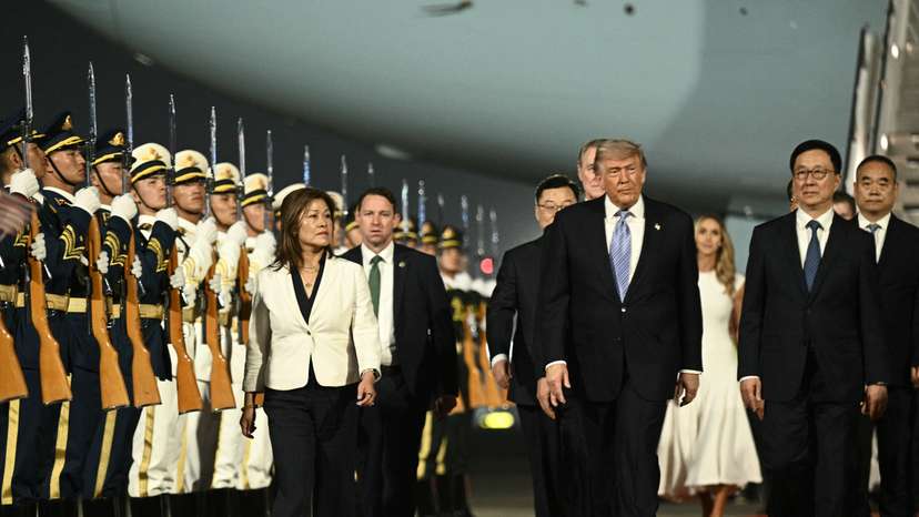 Trump lands in Beijing