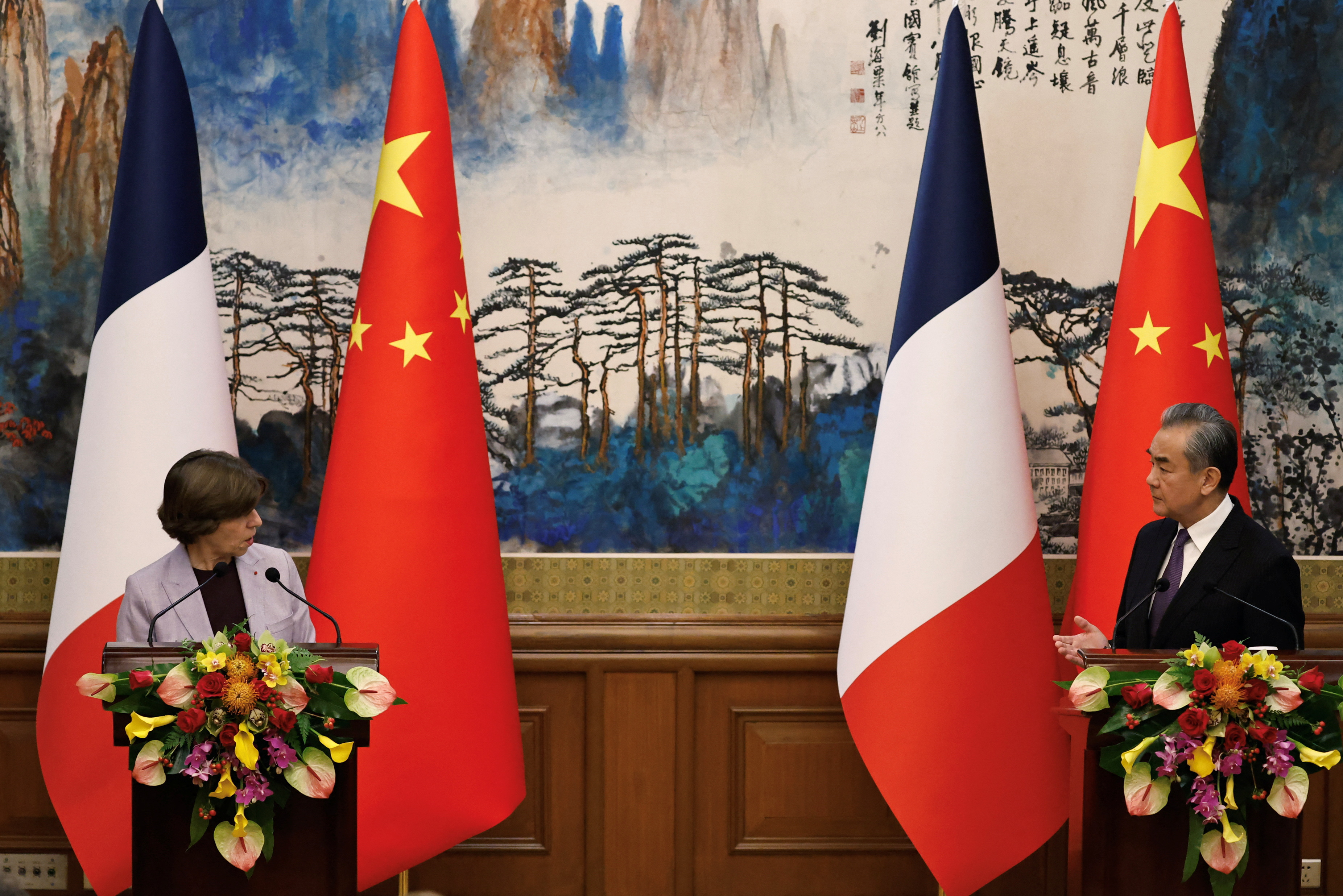 French Foreign Minister Catherine Colonna and Chinese Foreign Minister Wang Yi attend a press conference in Beijing
