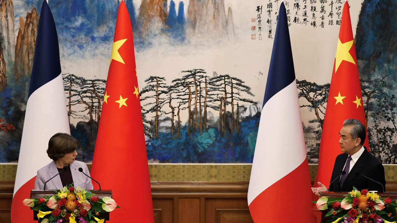French Foreign Minister Catherine Colonna and Chinese Foreign Minister Wang Yi attend a press conference in Beijing