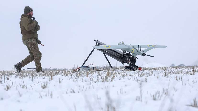 A Ukrainian serviceman prepares to launch precision-guided loitering munition in Kharkiv region