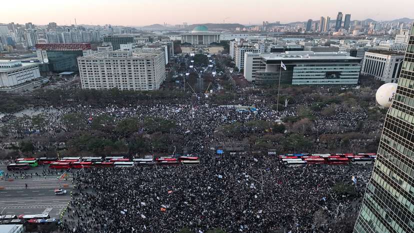 Protesters participate in a rally calling for the impeachment of South Korean President Yoon Suk Yeol, who declared martial law, which was reversed hours later, in front of the National Assembly in Seoul