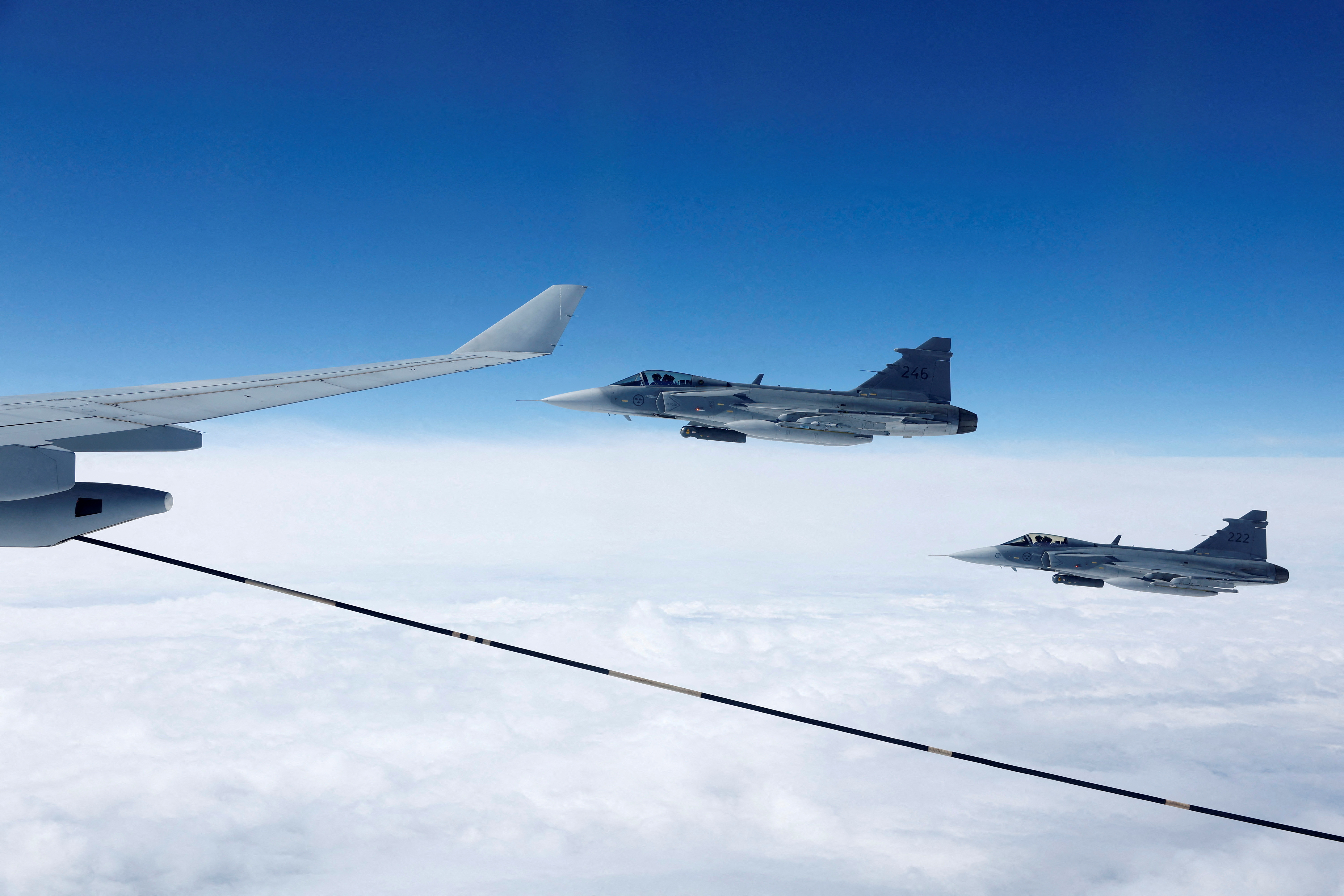 FILE PHOTO: Swedish Air Force Saab JAS 39 Gripen fighter jets fly during a media day