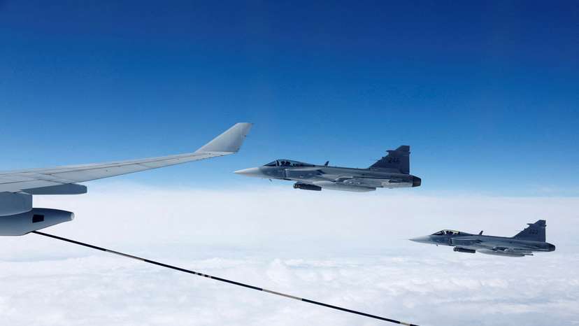 FILE PHOTO: Swedish Air Force Saab JAS 39 Gripen fighter jets fly during a media day
