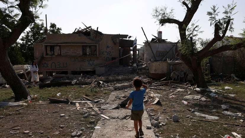 A rocket fired from the Gaza Strip damages a home, in central Israel