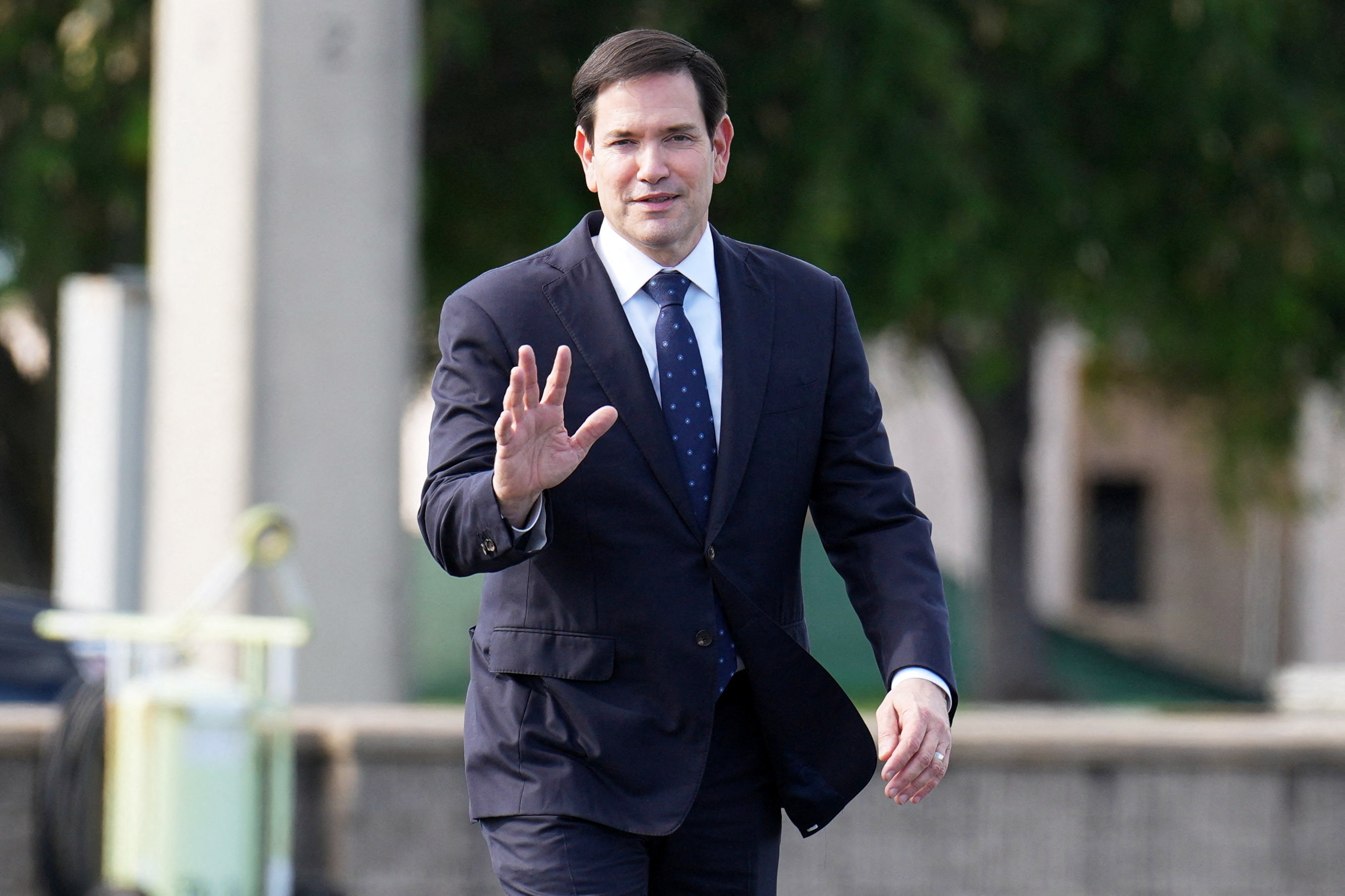 U.S. Secretary of State Marco Rubio arrives to board his plane at Homestead Air Reserve Base in Homestead