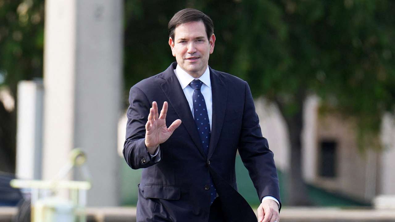 U.S. Secretary of State Marco Rubio arrives to board his plane at Homestead Air Reserve Base in Homestead