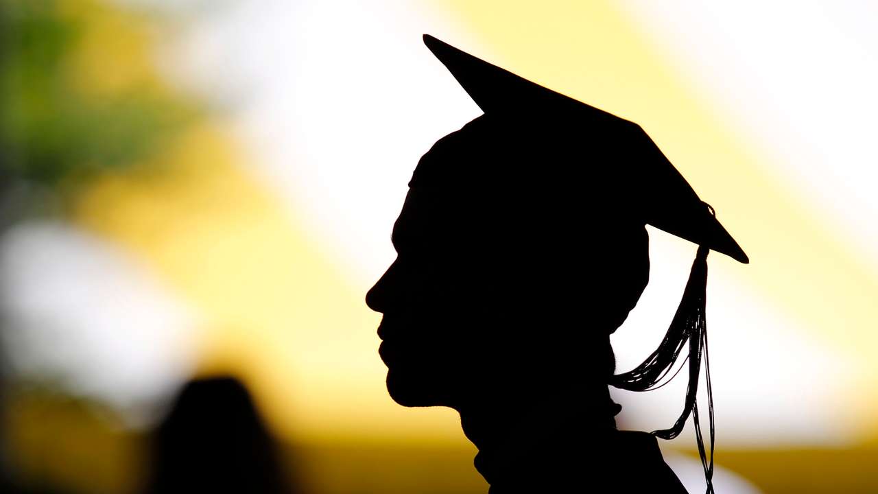 Students attend their graduation ceremony