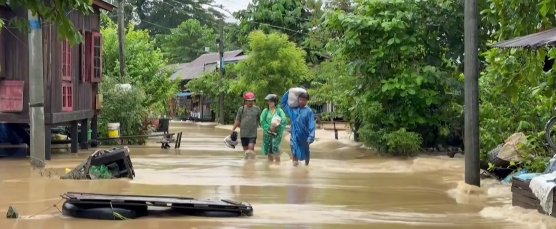 Myanmar residents take shelter in a school after severe flooding