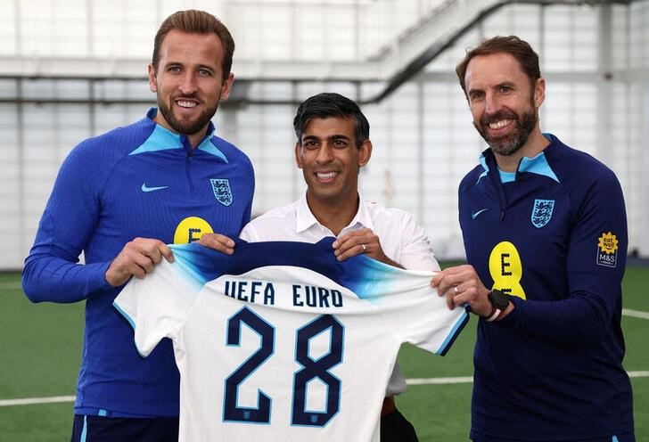 FILE PHOTO: Britain's Prime Minister Rishi Sunak visits St George's Park