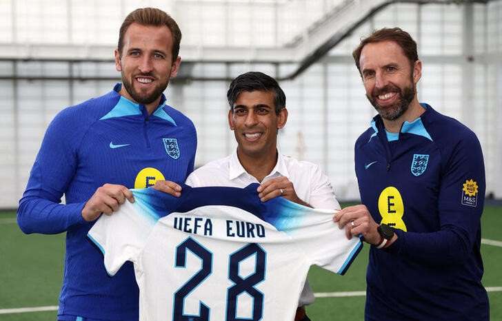 FILE PHOTO: Britain's Prime Minister Rishi Sunak visits St George's Park