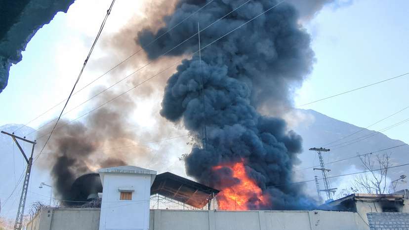 Smoke and flames rise from the premises of U.N. office, after it was set ablaze by protesters, following news of U.S. and Israeli strikes on Iran that killed supreme leader Ayatollah Ali Khamenei, in the city of Gilgit