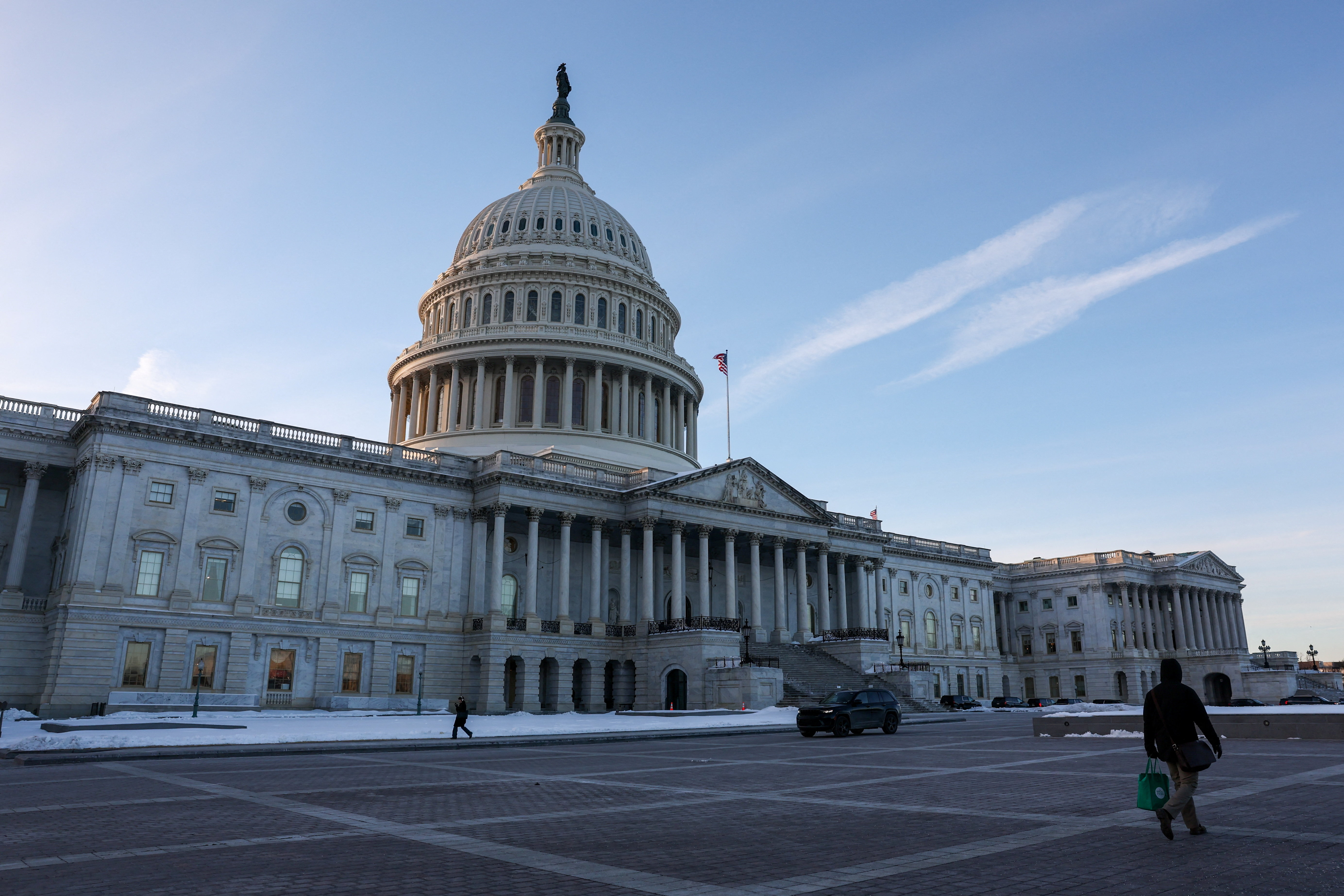 The sun sets on the U.S. Capitol building