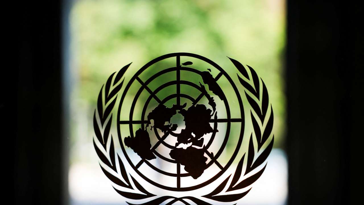 FILE PHOTO: The United Nations logo adorns a window at U.N. headquarters in New York City