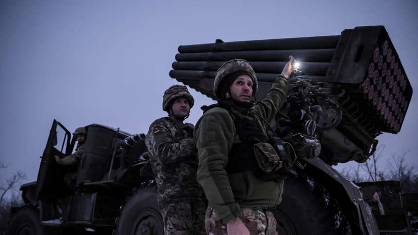 Ukrainian servicemen fire a Grad MLRS towards Russian troops near the frontline town of Chasiv Yar