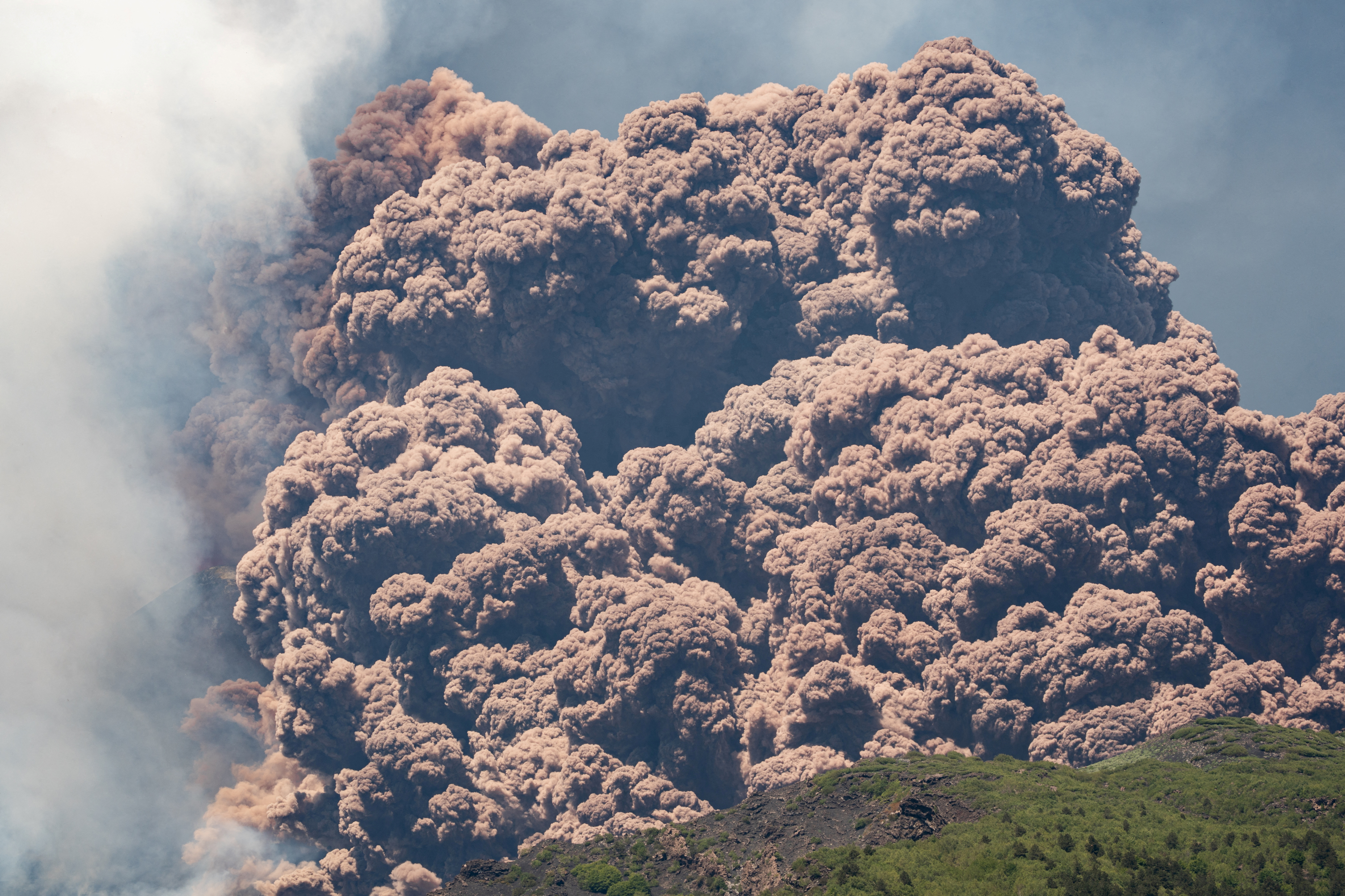 Italy's Mount Etna erupts