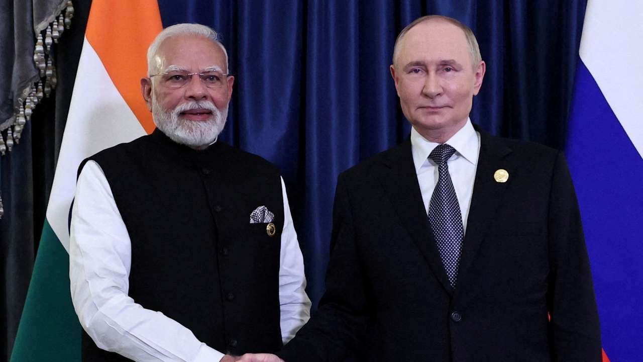 FILE PHOTO: Russian President Putin and Indian Prime Minister Modi meet at SCO summit in Tianjin