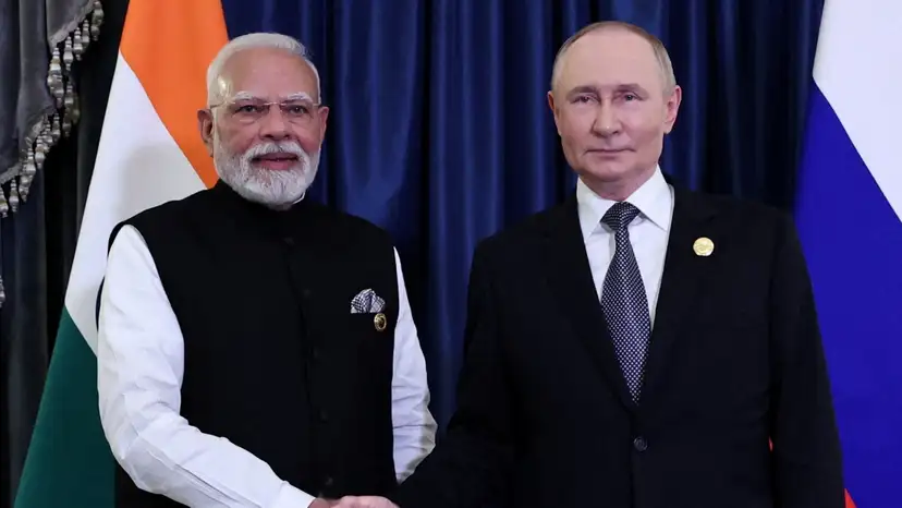 FILE PHOTO: Russian President Putin and Indian Prime Minister Modi meet at SCO summit in Tianjin