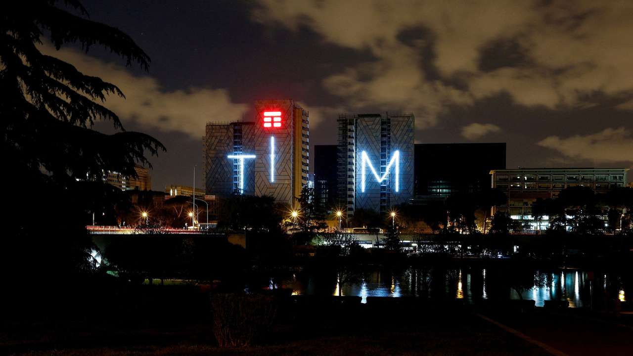 FILE PHOTO: Telecom Italia's new logo for the TIM brand is seen on a building in Rome