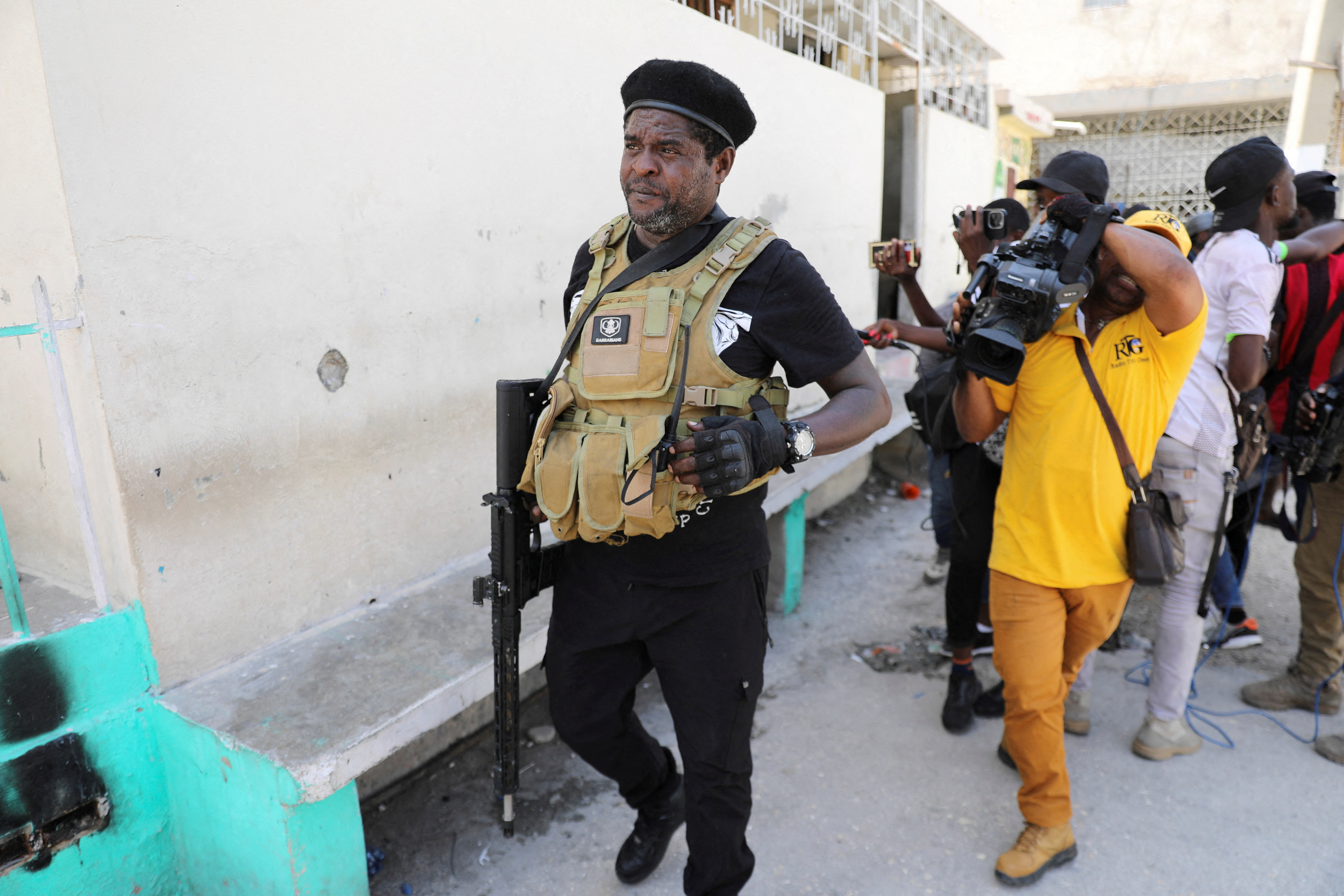 FILE PHOTO: Former police officer Jimmy "Barbecue" Cherizier addresses the media, in Port-au-Prince