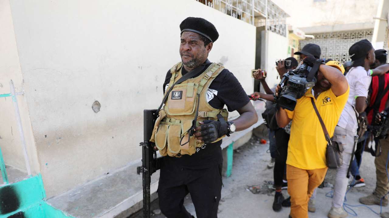 FILE PHOTO: Former police officer Jimmy "Barbecue" Cherizier addresses the media, in Port-au-Prince
