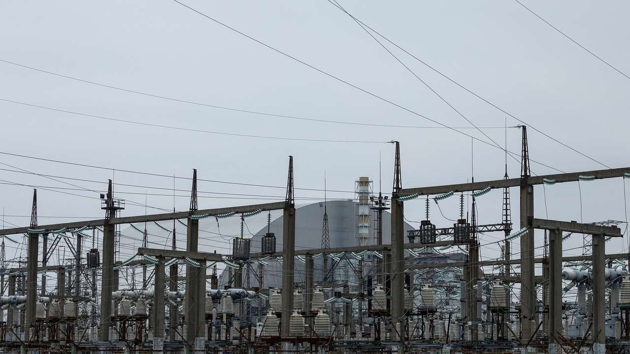 General view of the New Safe Confinement structure over the old sarcophagus covering the damaged fourth reactor at the Chornobyl Nuclear Power Plant