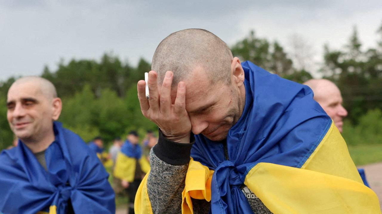 Ukrainian POWs after a swap at an unknown location in Ukraine