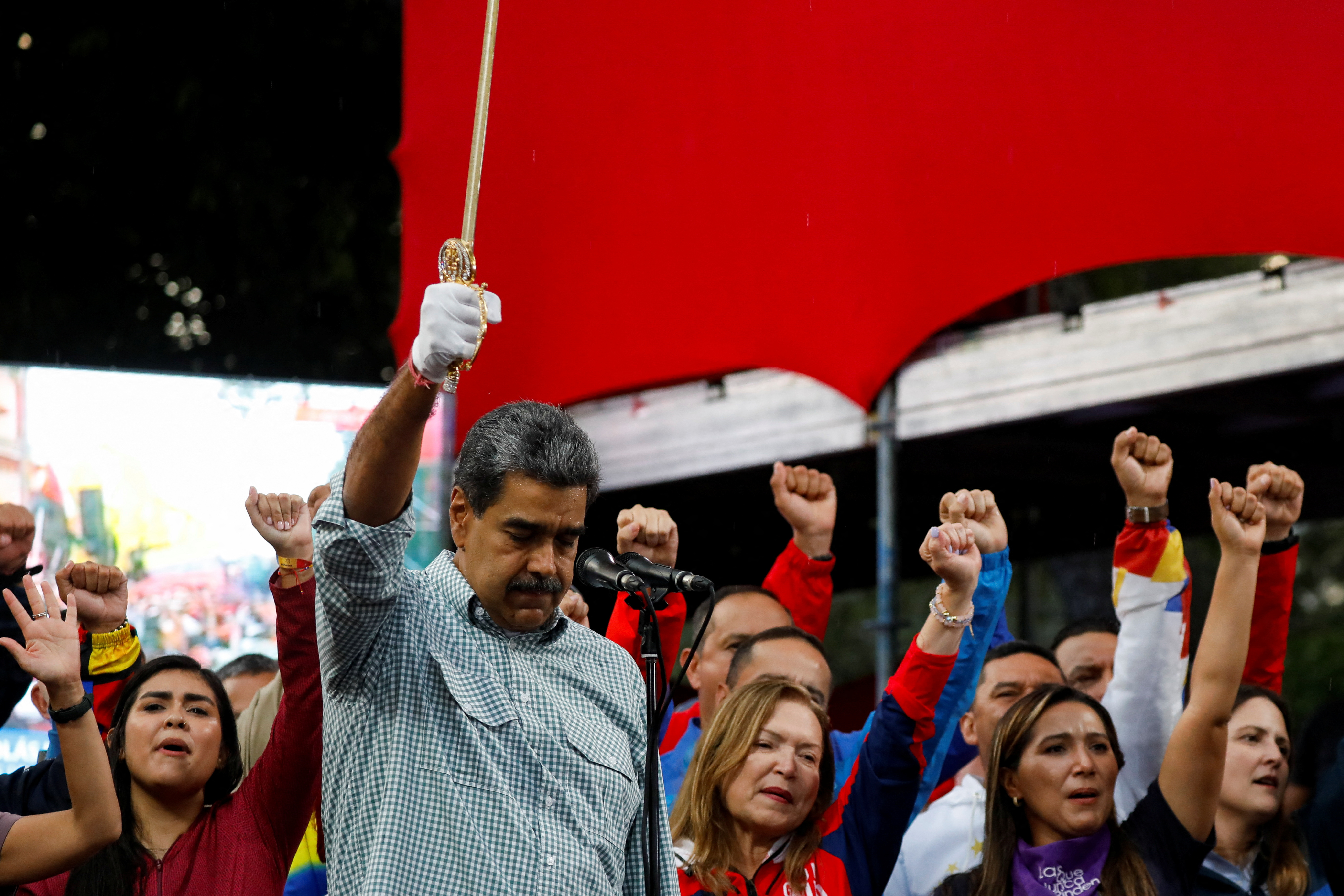 Government supporters celebrate the results of last month's presidential election, in Caracas