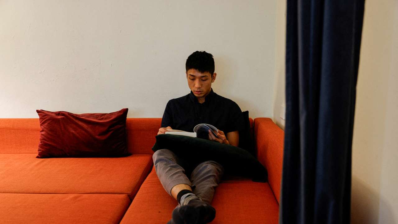 FILE PHOTO: Pro-democracy activist Owen Chow poses for photo after an interview in Hong Kong
