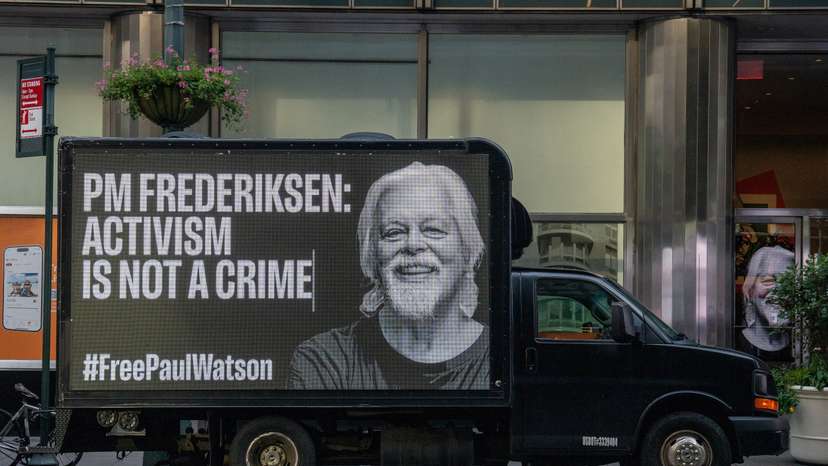 Trucks with digital billboards displaying a photo of Paul Watson and calling for his release