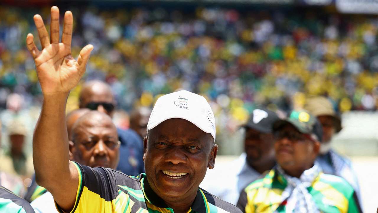 FILE PHOTO: President of South Africa and of the African National Congress (ANC) Cyril Ramaphosa waves to supporters as he arrives for the 112th anniversary celebrations of the founding of the party, at Mbombela Stadium in Mpumalanga province, South Africa, January 13, 2024. REUTERS/Siphiwe Sibeko