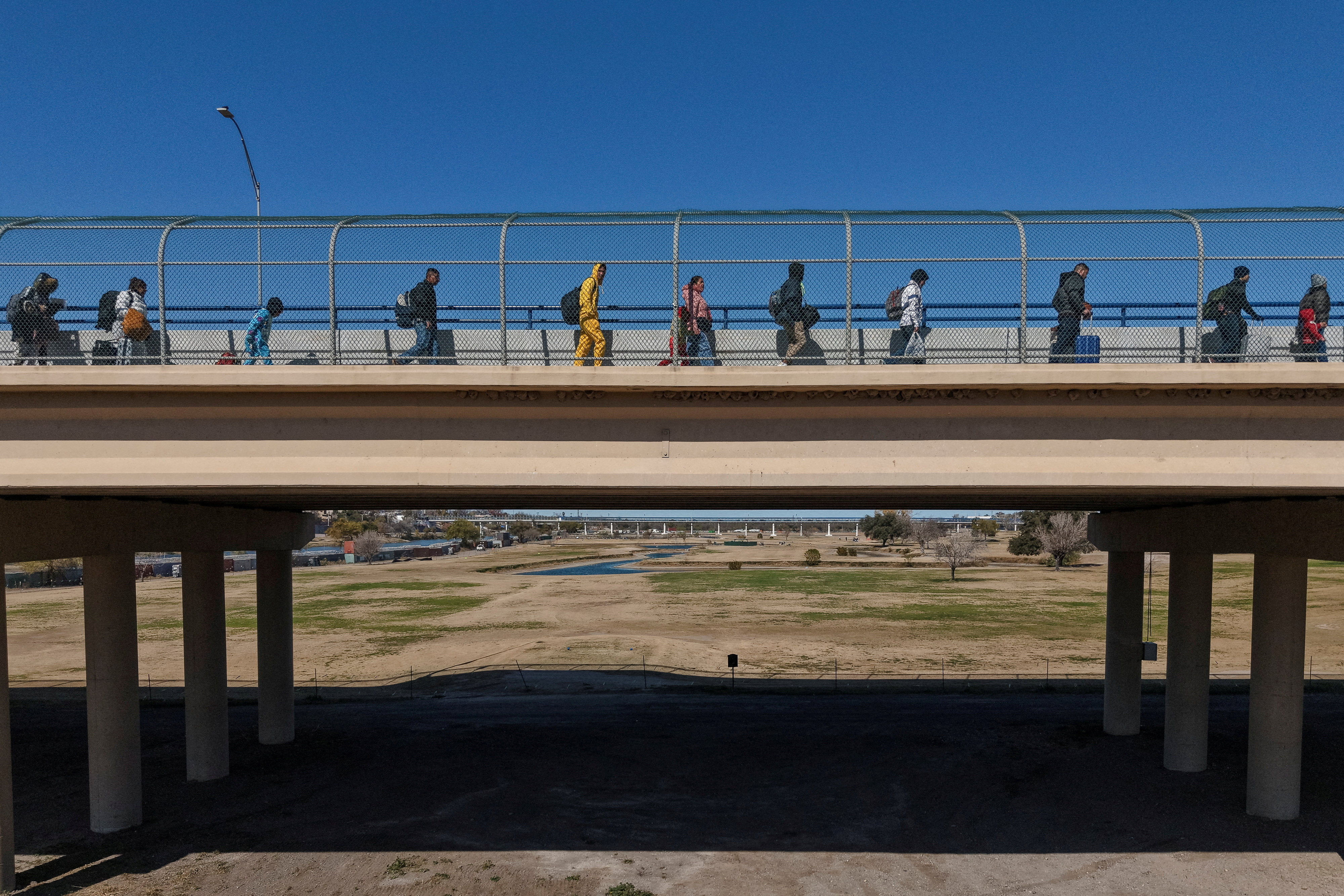 FILE PHOTO: Migrants seek asylum ahead of the inauguration of U.S. President-elect Donald Trump