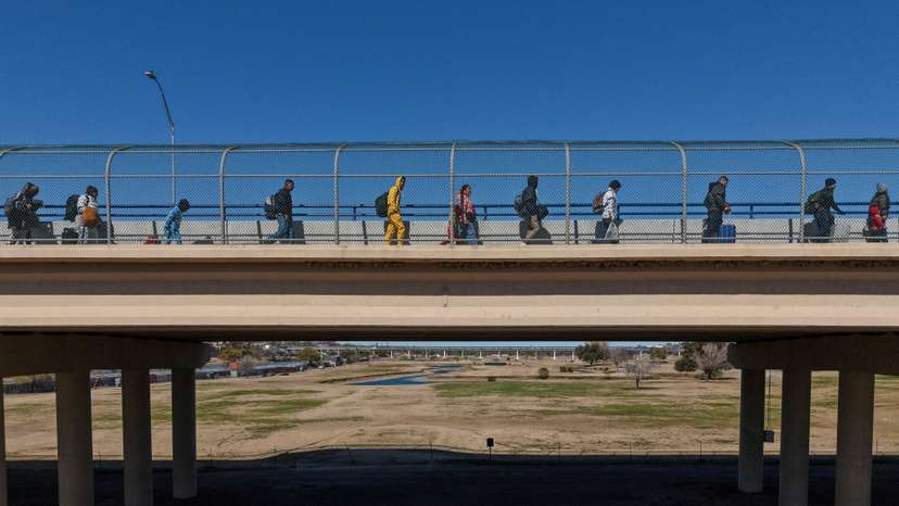 FILE PHOTO: Migrants seek asylum ahead of the inauguration of U.S. President-elect Donald Trump