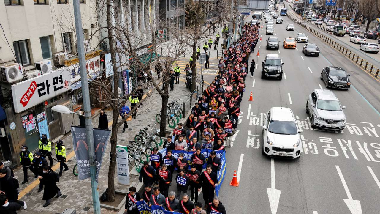 South Korean doctors march to protest against the government's medical policy in Seoul