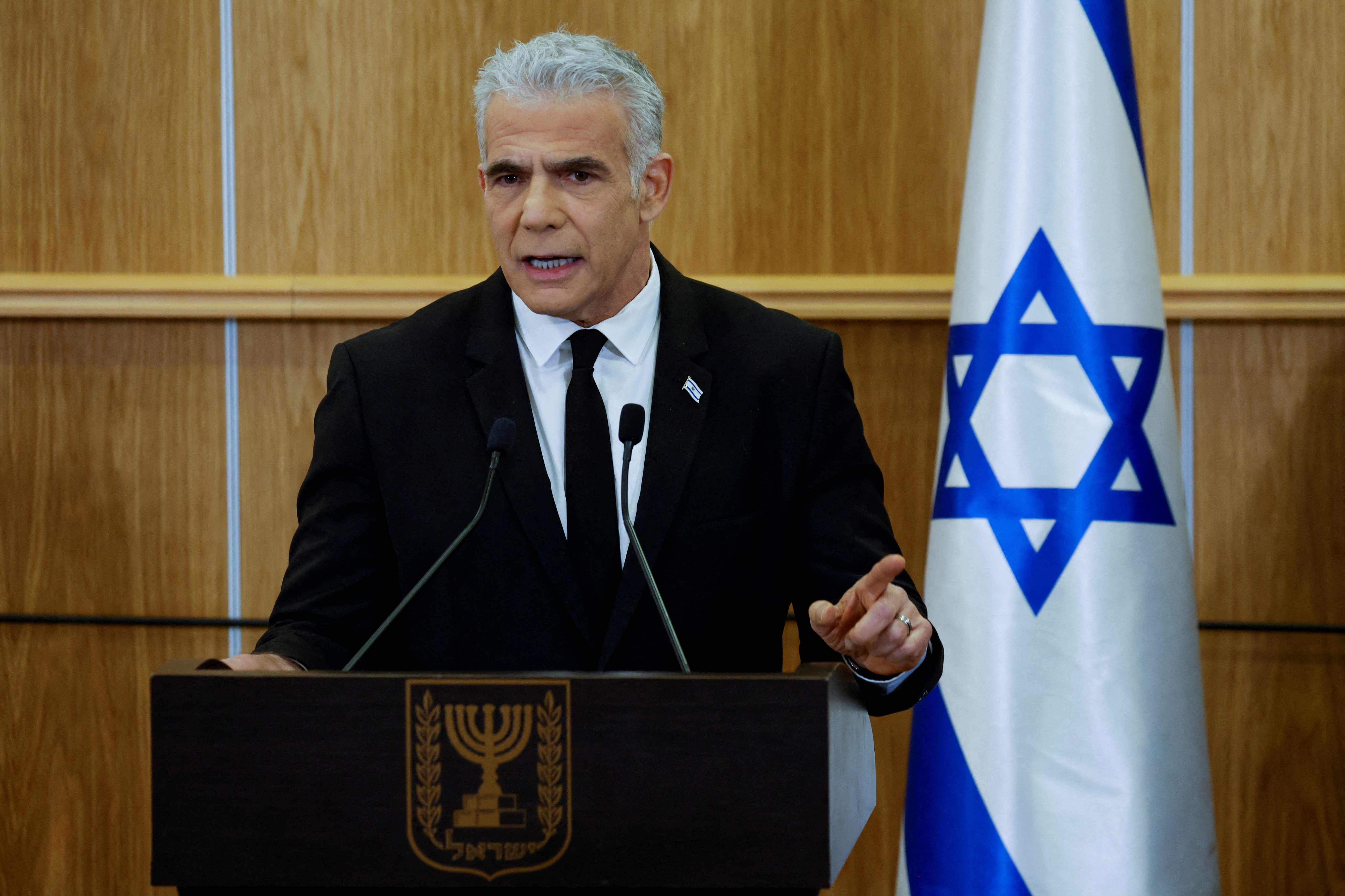 FILE PHOTO: Israeli opposition head Yair Lapid delivers a statement at the Knesset, in Jerusalem