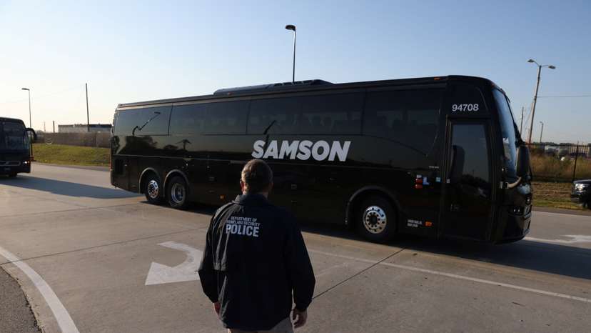 Buses transporting workers detained in a huge U.S. immigration raid last week on a car battery plant arrive at Hartsfield-Jackson Atlanta International Airport