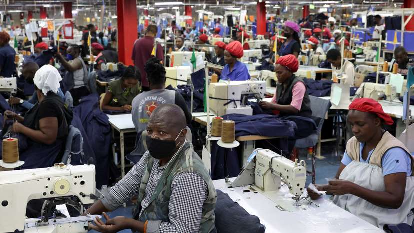 FILE PHOTO: Kenyan workers prepare clothes for export at the United Aryan EPZ factory in Ruaraka district of Nairobi