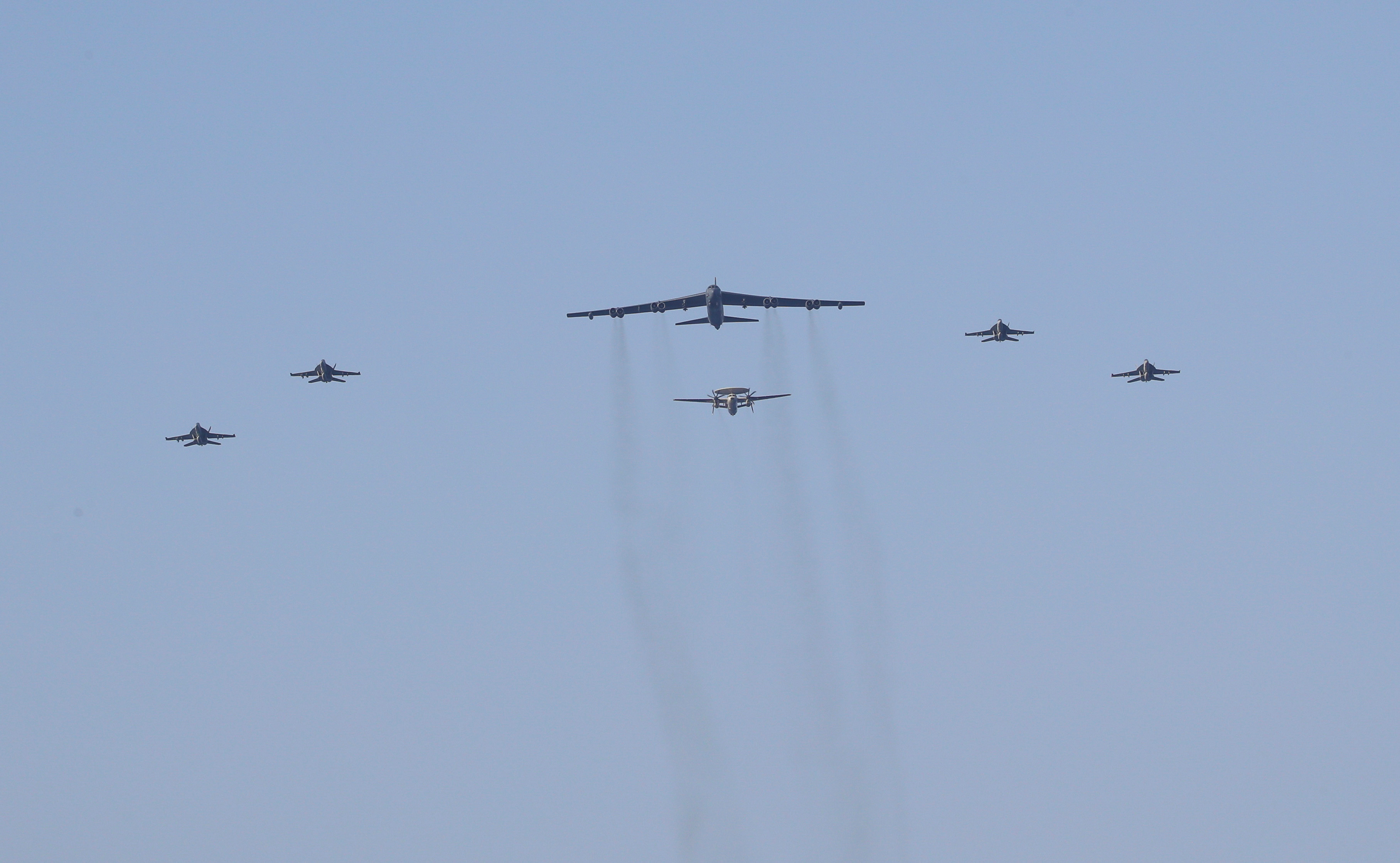 United States aircraft carrier Abraham Lincoln (CVN 72) and a U.S. Air Force B-52H Stratofortress, deployed to the region, conduct joint exercises in Arabian Sea