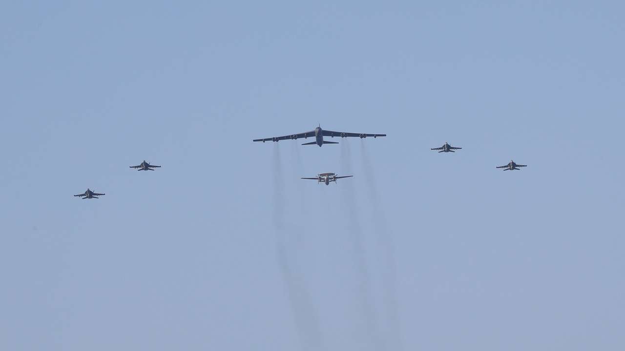 United States aircraft carrier Abraham Lincoln (CVN 72) and a U.S. Air Force B-52H Stratofortress, deployed to the region, conduct joint exercises in Arabian Sea