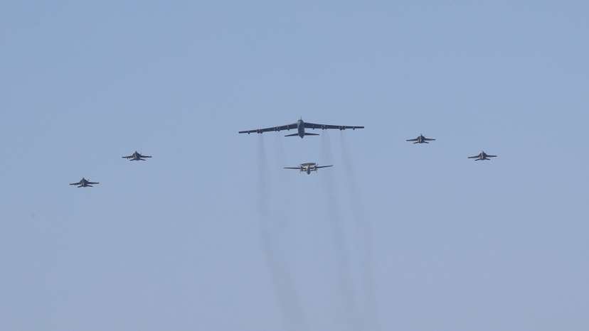 United States aircraft carrier Abraham Lincoln (CVN 72) and a U.S. Air Force B-52H Stratofortress, deployed to the region, conduct joint exercises in Arabian Sea