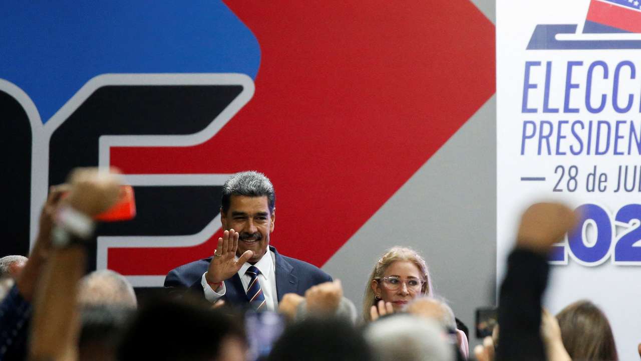 Venezuela's President Nicolas Maduro meets with Elvis Amoroso, head of the CNE, in Caracas