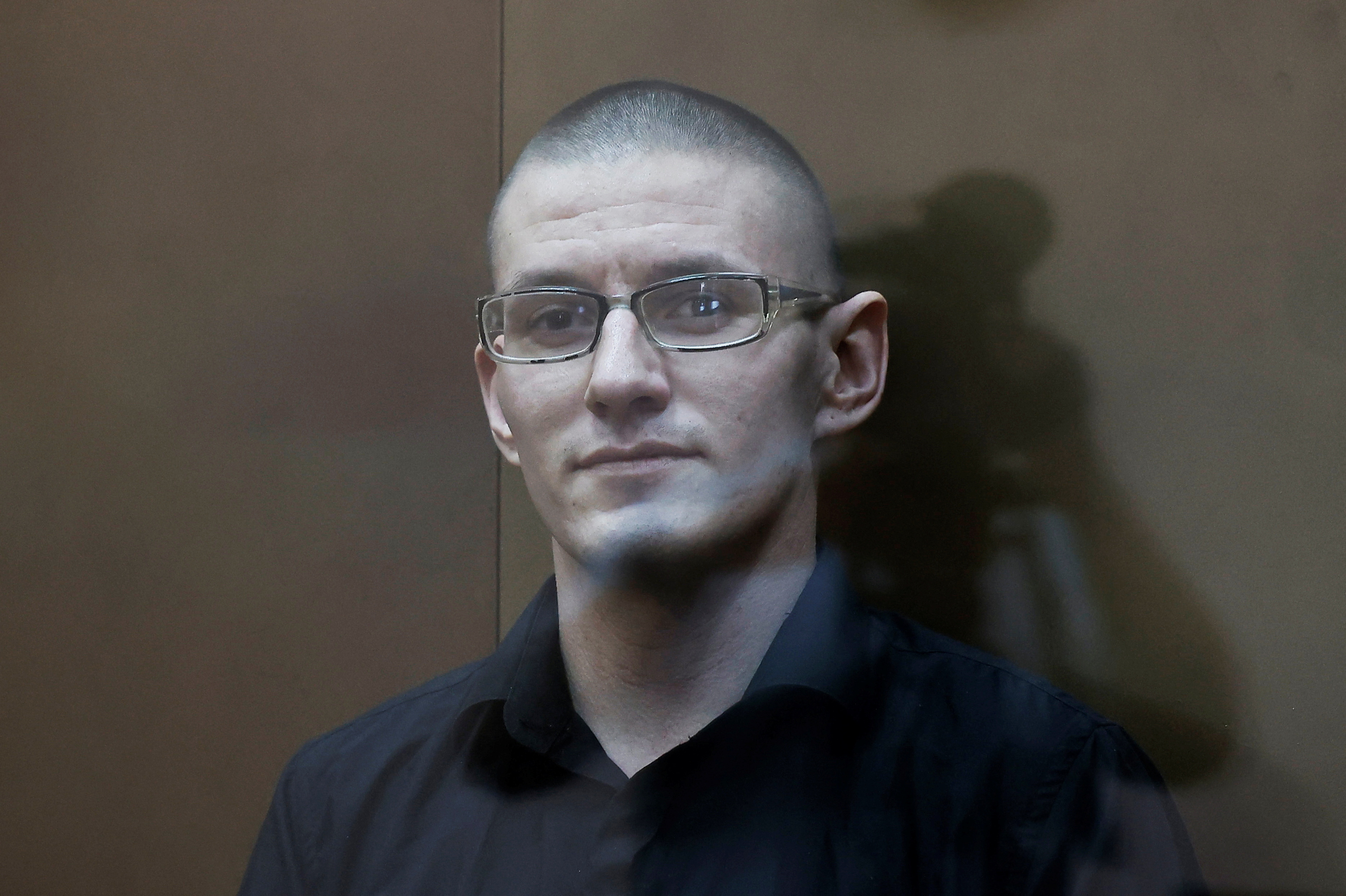 U.S. citizen Robert Woodland attends a court hearing in Moscow