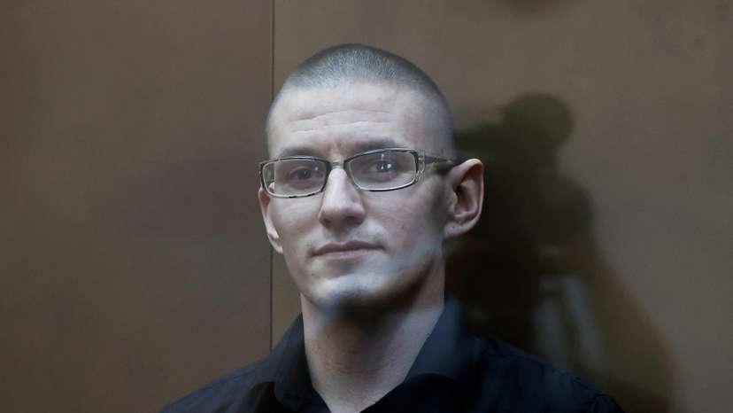 U.S. citizen Robert Woodland attends a court hearing in Moscow