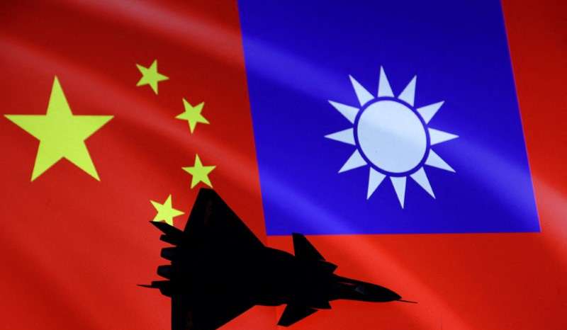 FILE PHOTO: Illustration shows airplane, Chinese and Taiwanese flags