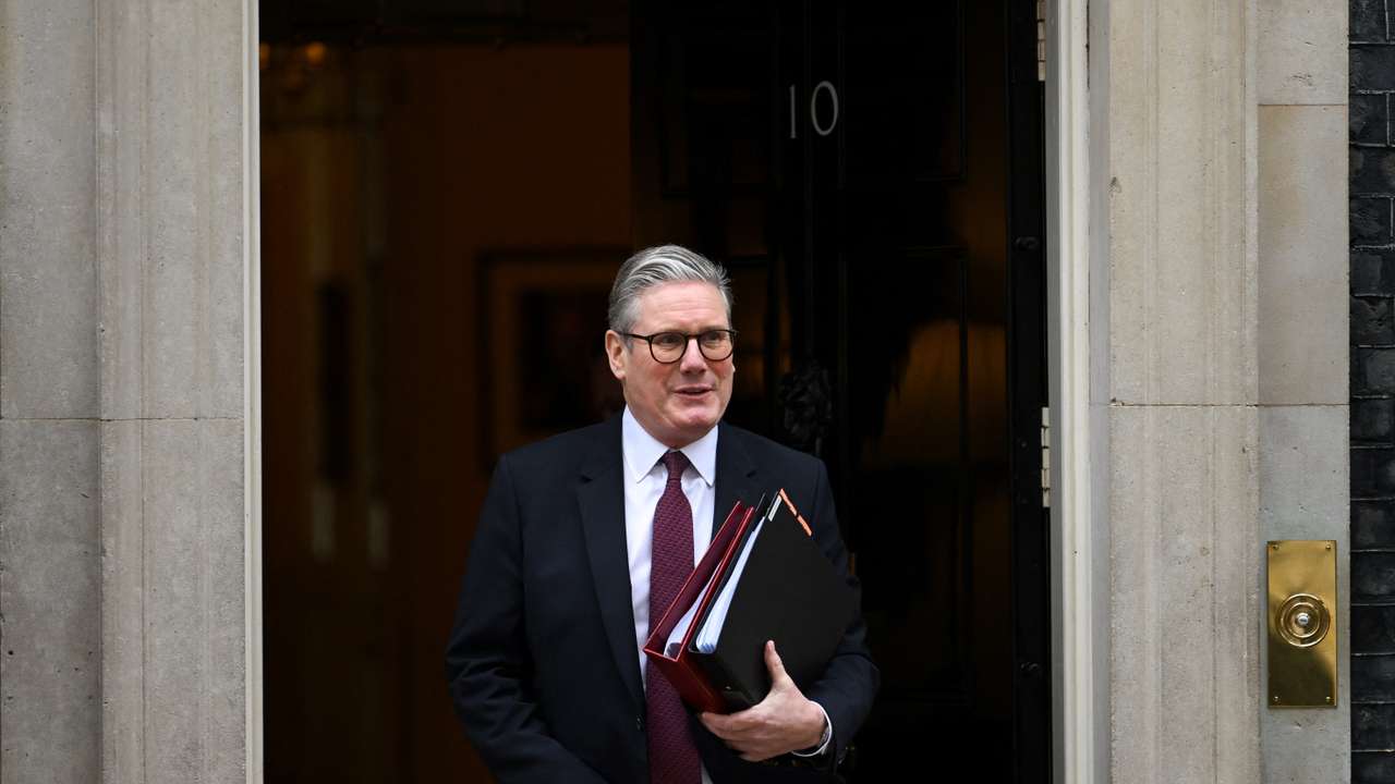 British Prime Minister Keir Starmer walks on Downing Street