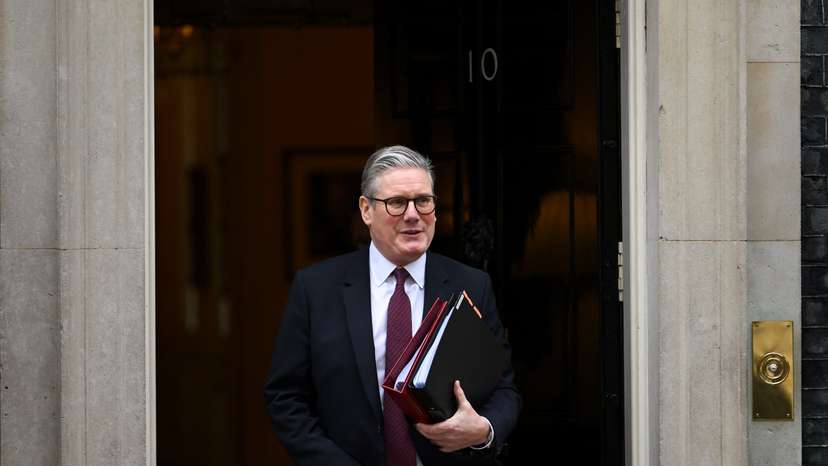 British Prime Minister Keir Starmer walks on Downing Street