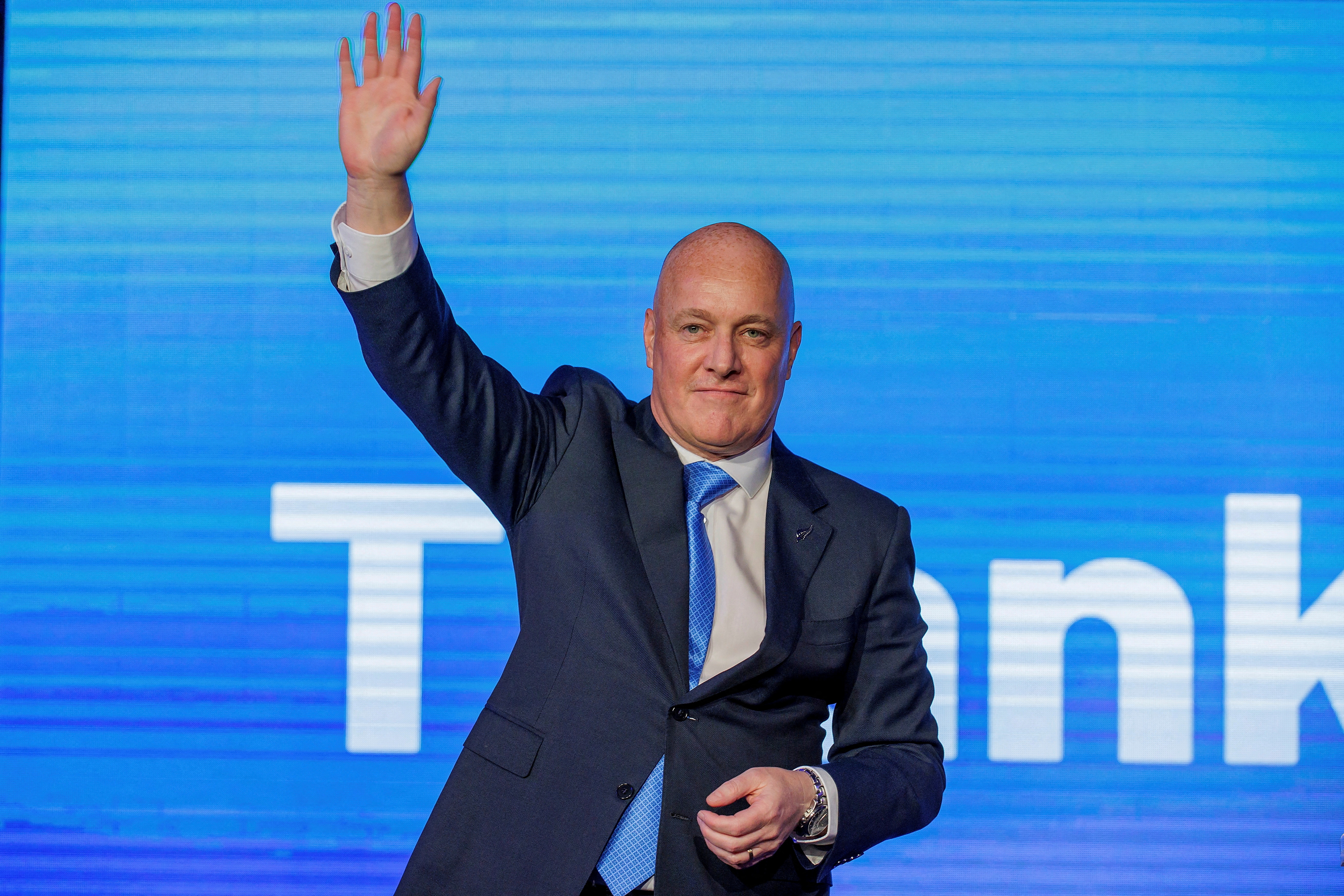FILE PHOTO: Christopher Luxon, Leader of the National Party waves to supporters in Auckland