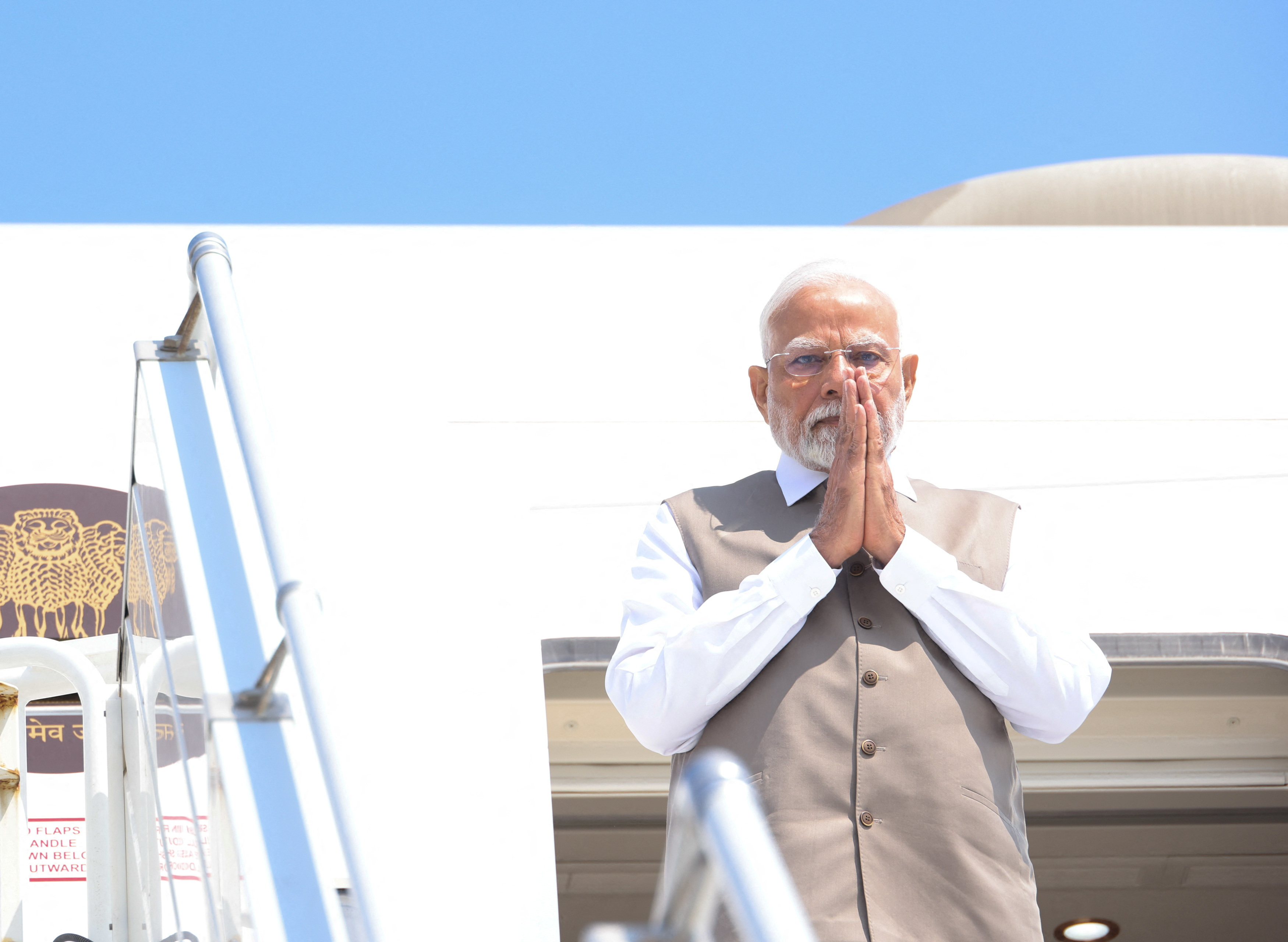 India's Prime Minister Narendra Modi is received by Cypriot President Nikos Christodoulides during his state visit, at the Larnaca International Airport, in Larnaca