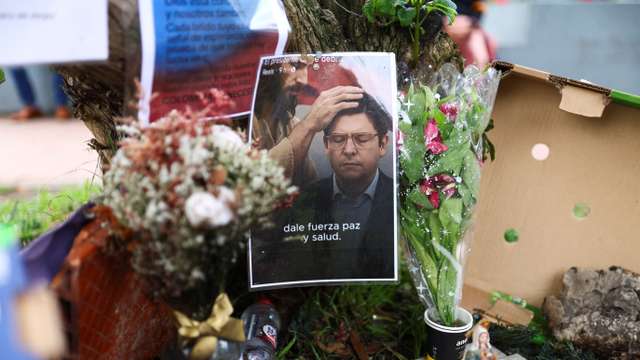 Tributes at place where Colombian Senator Uribe was shot during campaign event, in Bogota